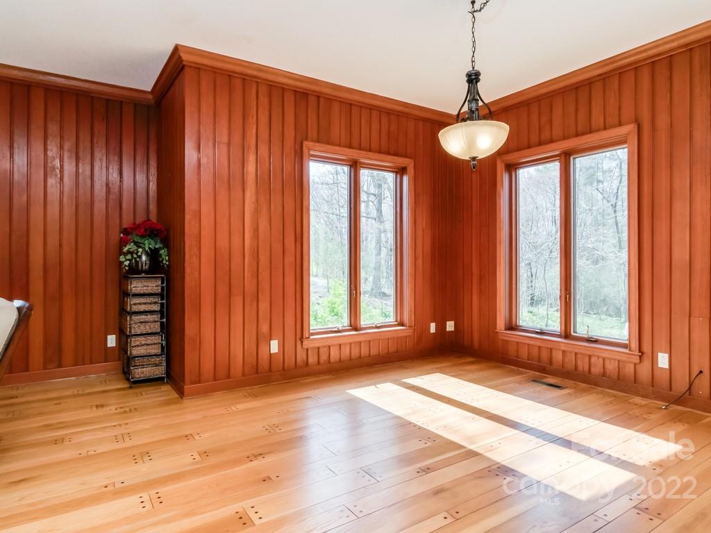 2214 Wishbone Road Monroe, NC 28112 - Photo 10 of 44 a view of an empty room with a window and hardwood floor