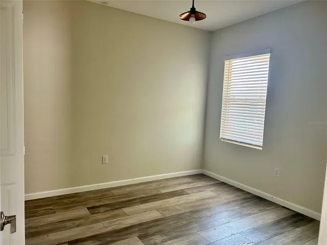 an empty room with a window