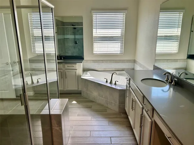 a kitchen with a window a sink and a cabinets