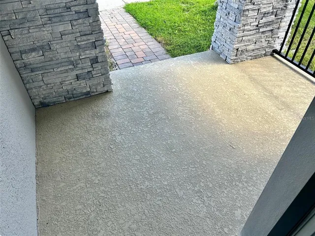 a view of backyard with green space