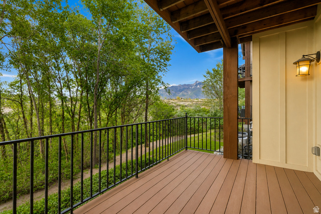 1429 Chateau Ridge Way Sandy, UT 84092 - Photo 13 of 22 Expansive balcony featuring composite decking and a black metal railing