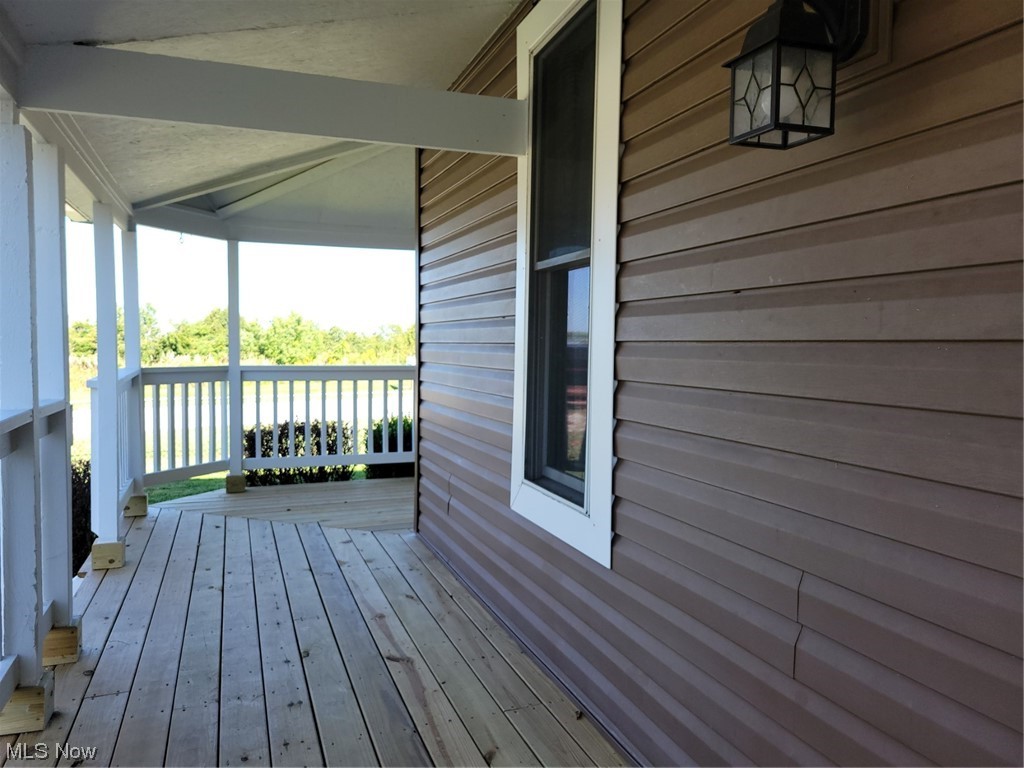 22922 Putney Ridge Road Quaker City, OH 43773 - Photo 29 of 31 View of deck