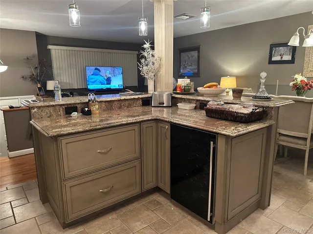 a bedroom with a bed and a table in it