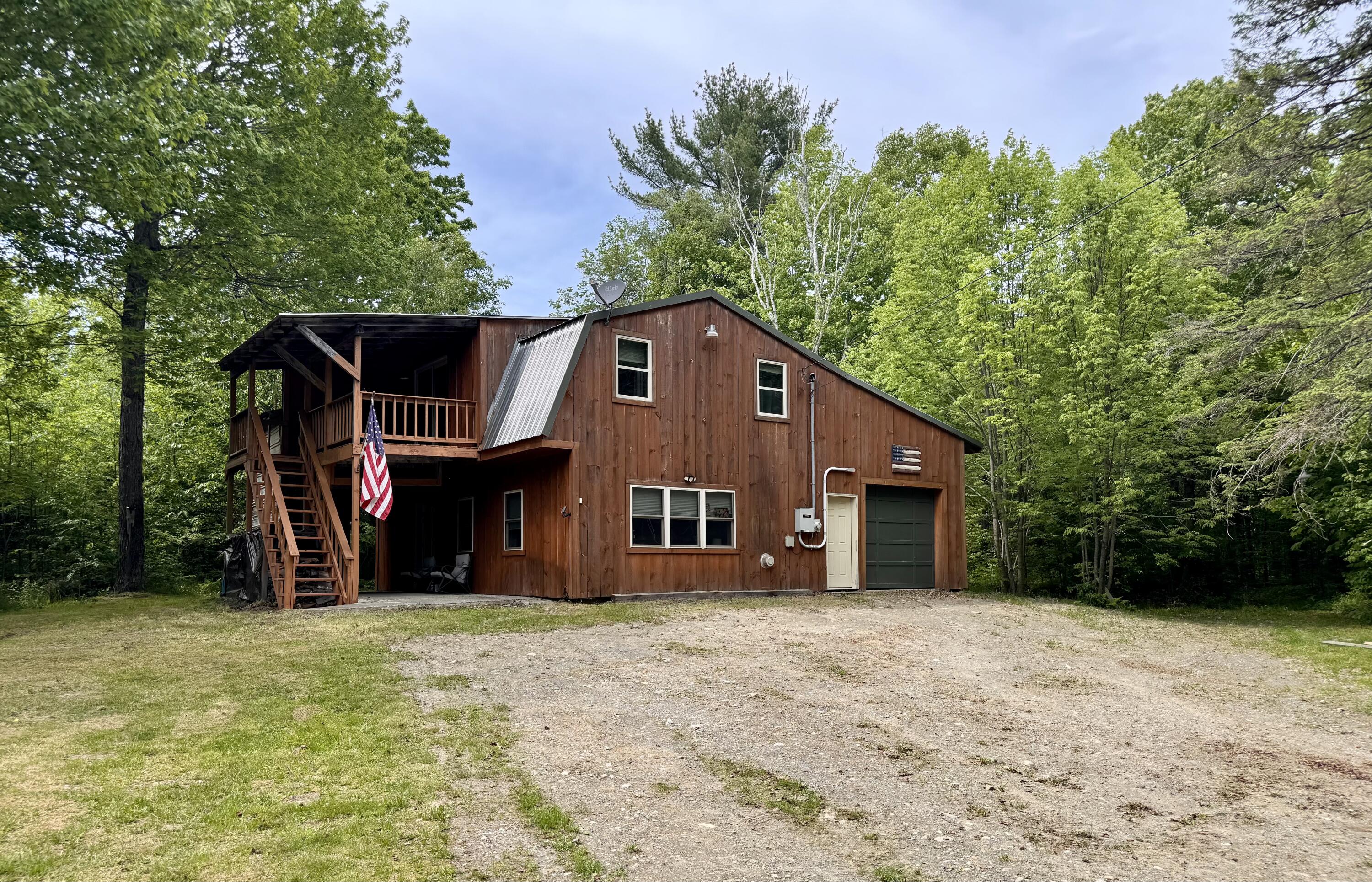 141 Parkman Road Wellington, ME 04942 - Photo 2 of 17 Front with single car garage
