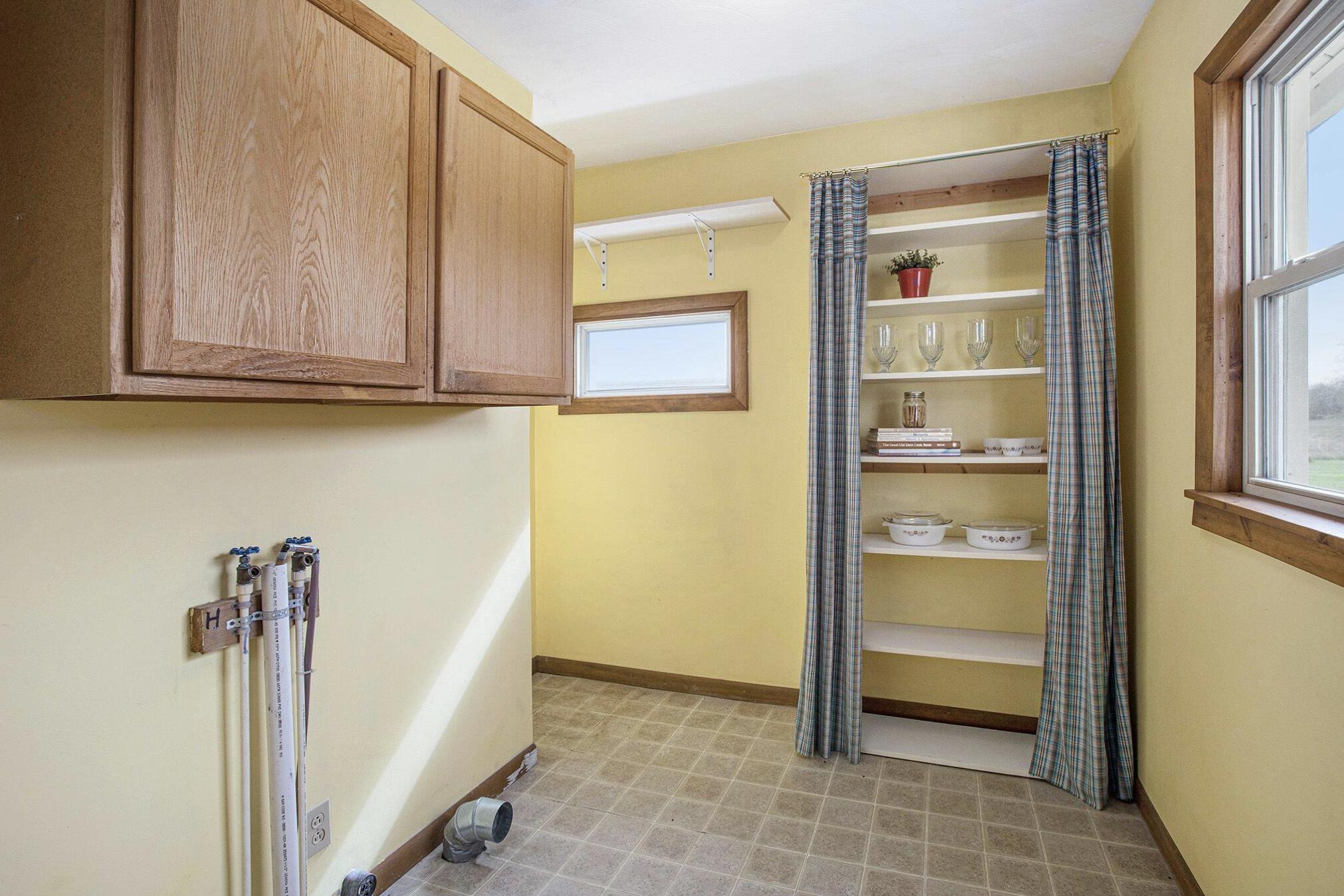 4371 South Ainger Road Charlotte, MI 48813 - Photo 7 of 15 PANTRY/LAUNDRY ROOM