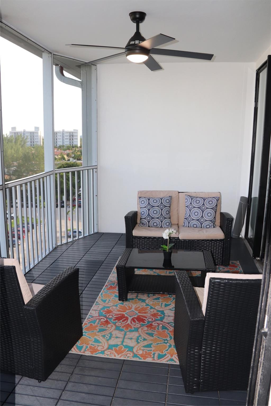 1770 Northeast 191st Street, Unit 816 Miami, FL 33179 - Photo 31 of 33 a view of a workspace with furniture and window