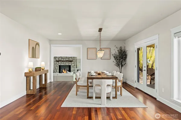 a view of a livingroom with furniture window and wooden floor