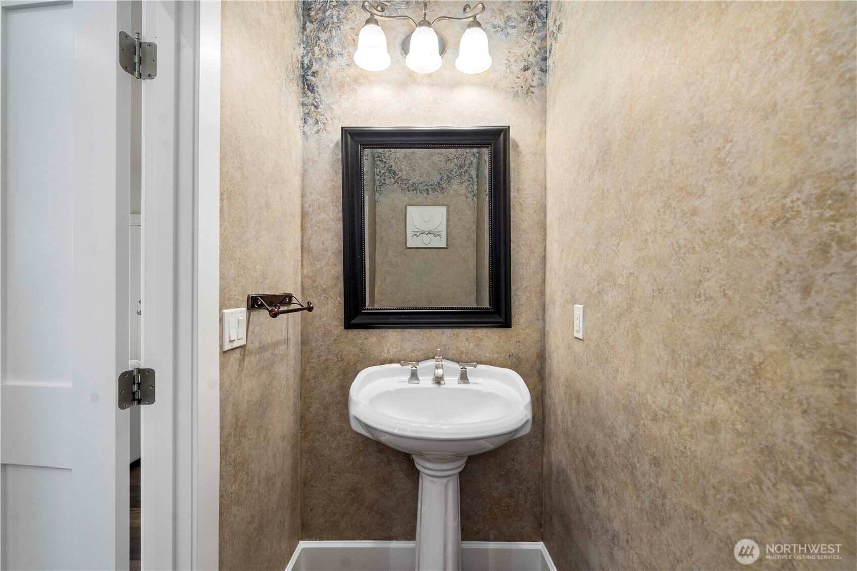 11028 East Riverside Drive Bothell, WA 98011 - Photo 19 of 40 a bathroom with a sink and a mirror