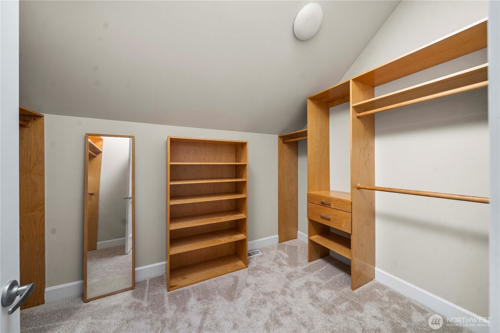 11028 East Riverside Drive Bothell, WA 98011 - Photo 25 of 40 a view of walk in closet with empty racks