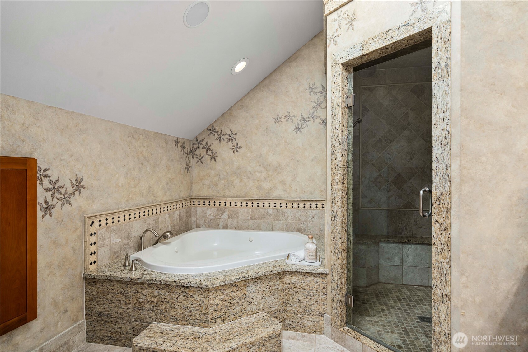 11028 East Riverside Drive Bothell, WA 98011 - Photo 26 of 40 a bathroom with a granite countertop shower