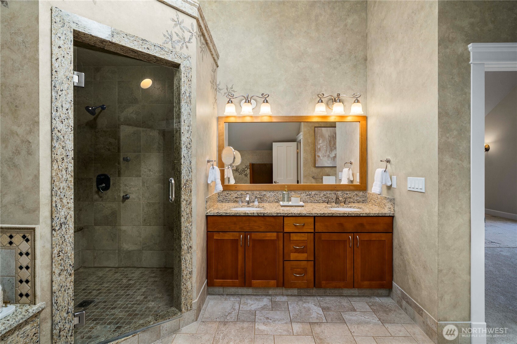 11028 East Riverside Drive Bothell, WA 98011 - Photo 28 of 40 a bathroom with a granite countertop sink and a mirror
