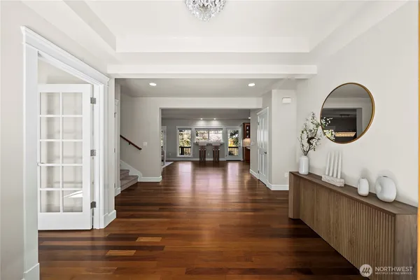 a view of a living room and dining room