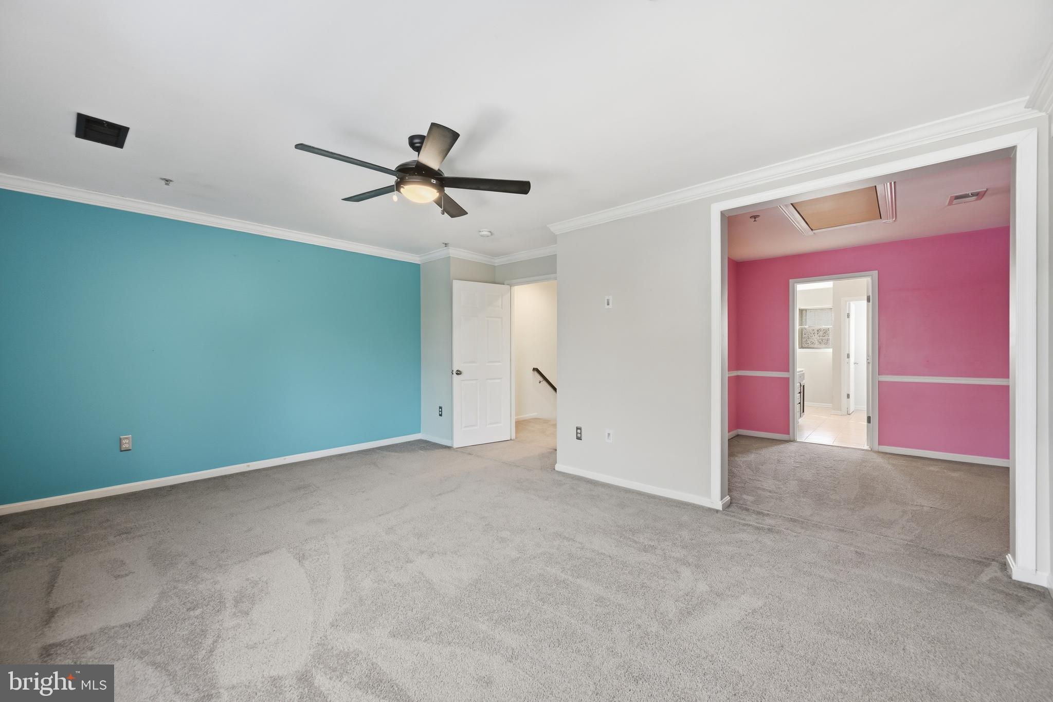 18733 Falling River Drive Gaithersburg, MD 20879 - Photo 14 of 34 a view of an empty room with a ceiling fan