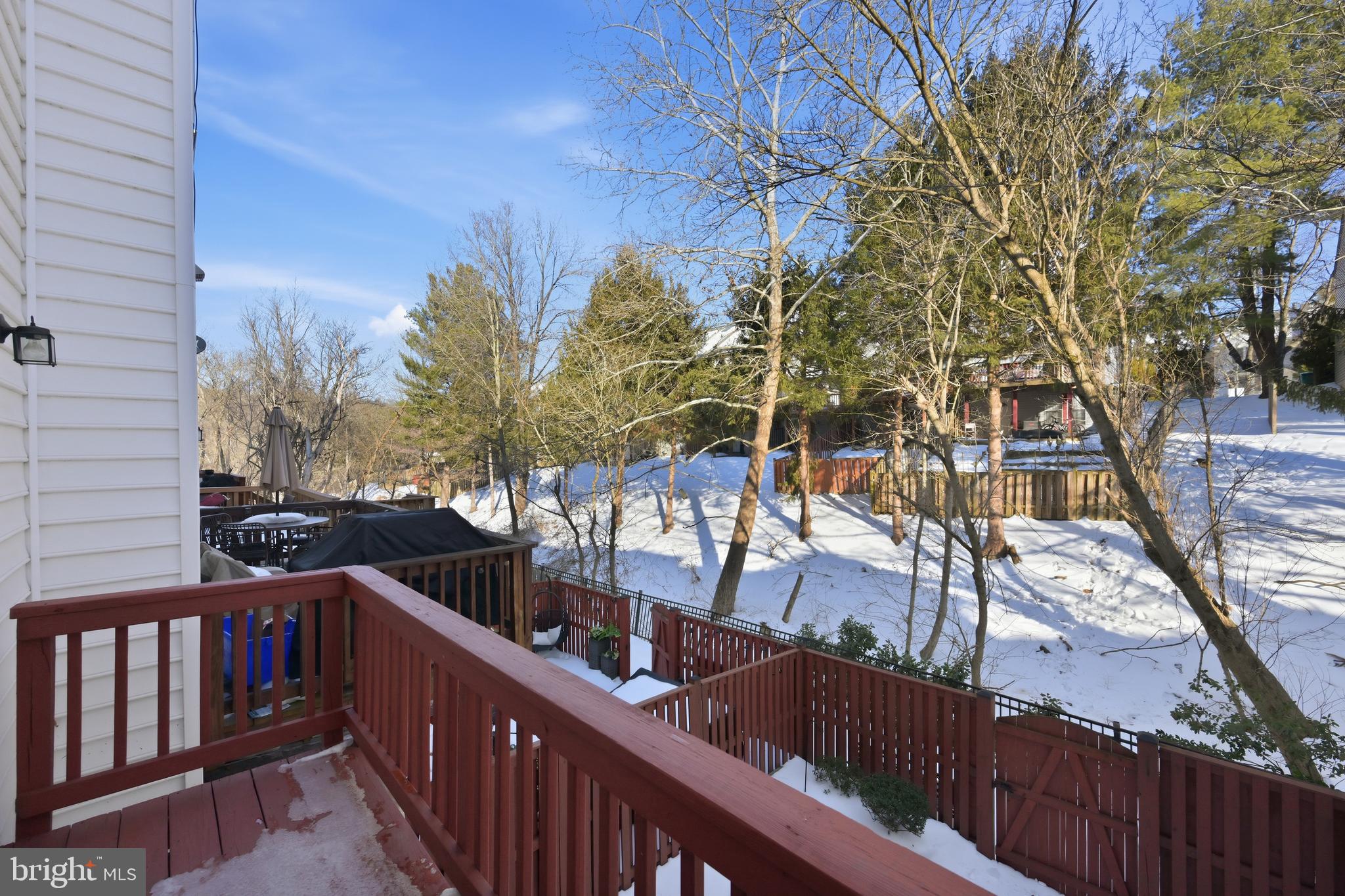 18733 Falling River Drive Gaithersburg, MD 20879 - Photo 28 of 34 a view of balcony with wooden floor and fence