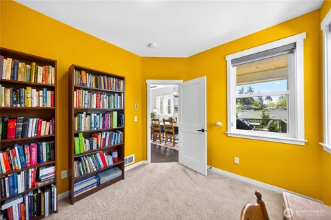 a view of room with bookshelf
