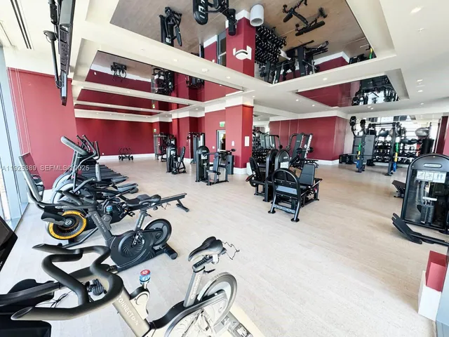 a view of a room with gym equipment