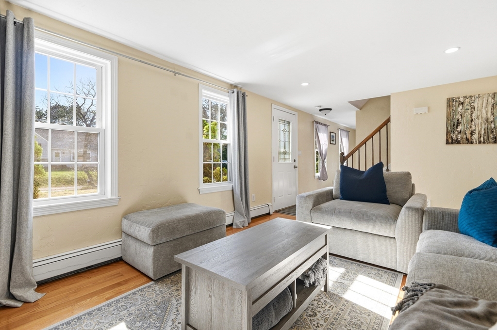 30 Huntington Road Plymouth, MA 02360 - Photo 10 of 35 a living room with furniture and a window