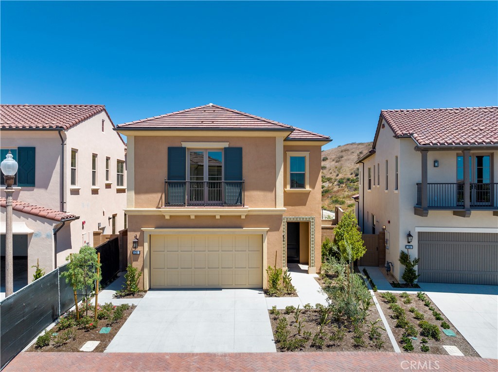 136 Tomahawk Irvine, CA 92618 - Photo 1 of 1 a front view of a house with a yard