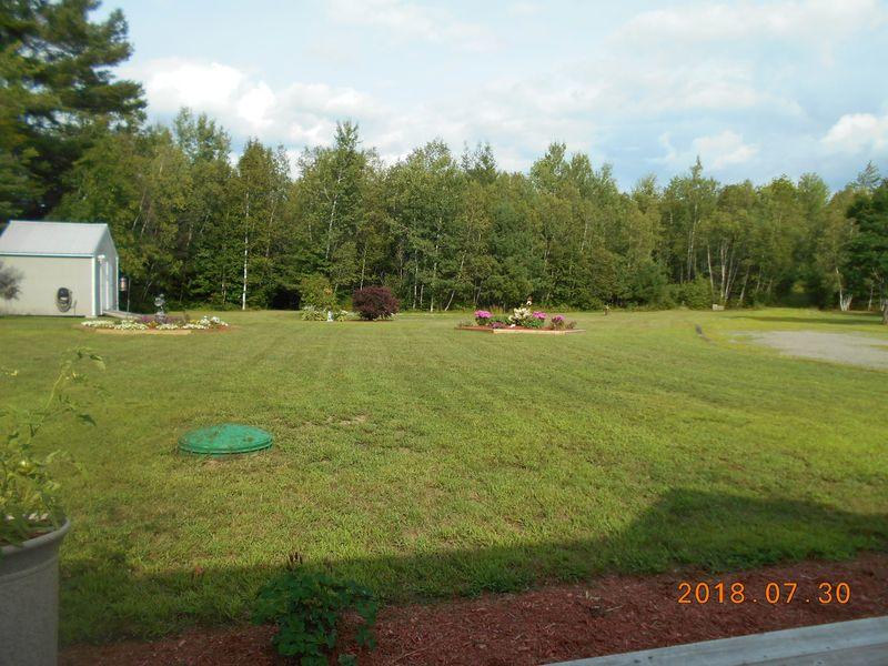 24 Adams Lane Solon, ME 04979 - Photo 25 of 30 0052 Enjoying the back yard from the dec