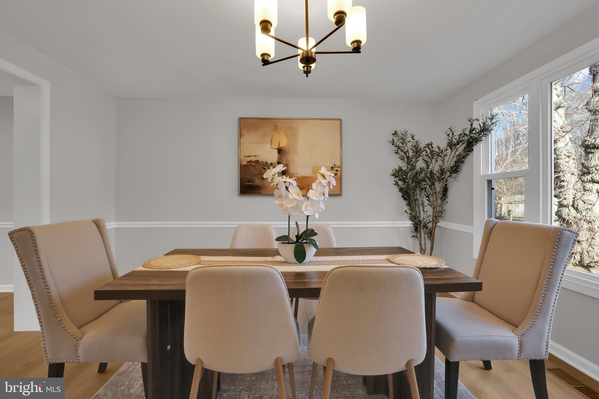 15101 Snowden Drive Silver Spring, MD 20905 - Photo 12 of 68 a view of a dining room with furniture and a window