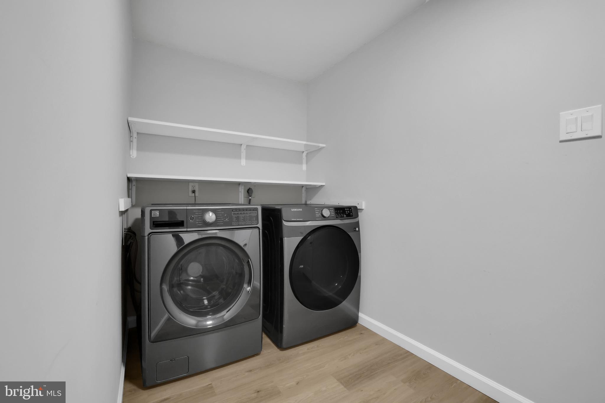 15101 Snowden Drive Silver Spring, MD 20905 - Photo 25 of 68 a close up view of a washer and dryer in a room