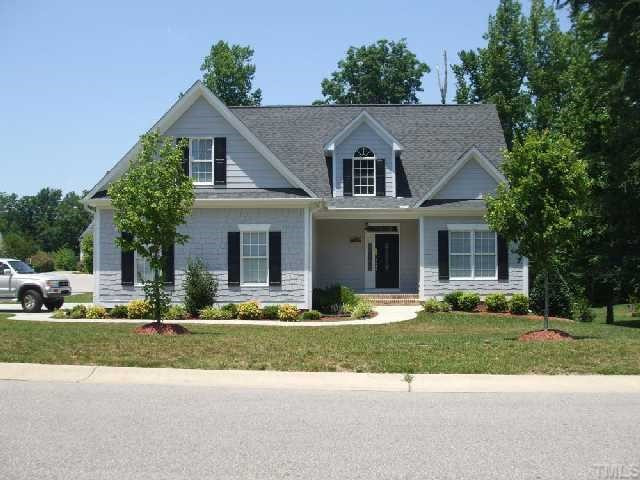 1707 Cheshire Bridge Road Durham, NC 27712 - Photo 1 of 1 a front view of a house with a yard