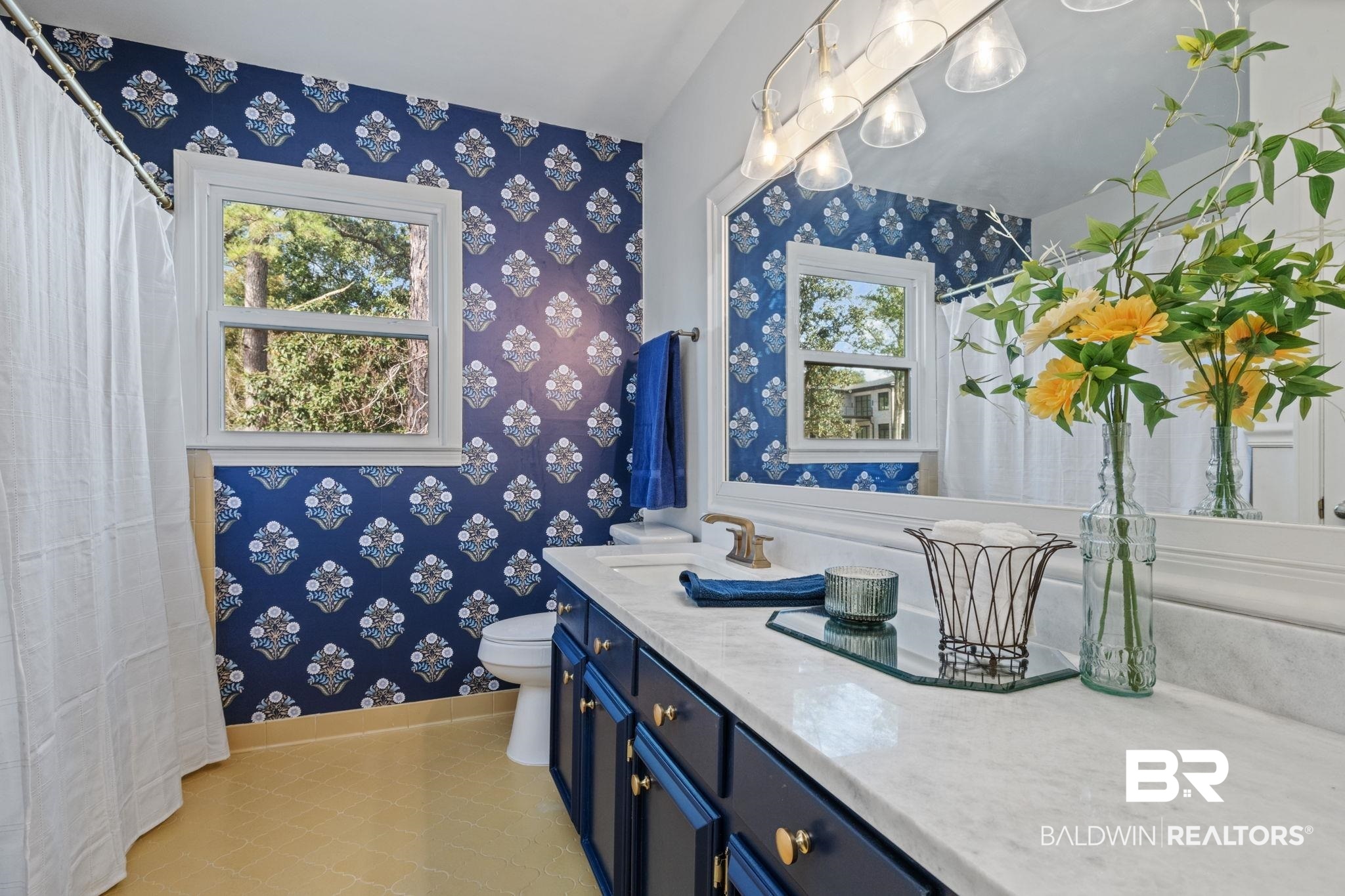 511 Wacker Lane North Mobile, AL 36608 - Photo 29 of 45 Bathroom with wallpapered walls, vanity, a shower with curtain, and plenty of natural light