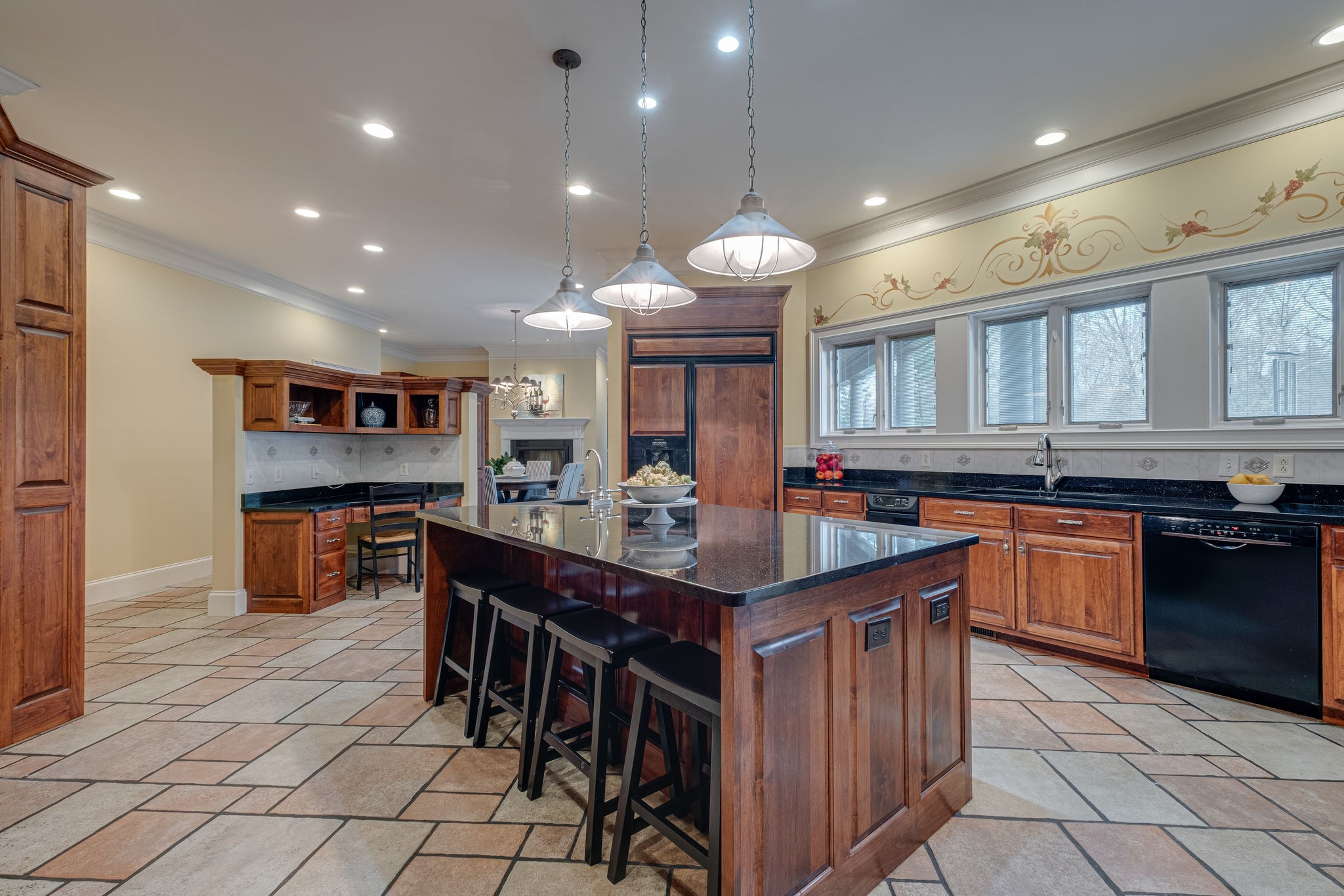 1727 Shagbark Trail Murfreesboro, TN 37130 - Photo 11 of 32 a kitchen with stainless steel appliances granite countertop counter space a sink refrigerator and cabinets