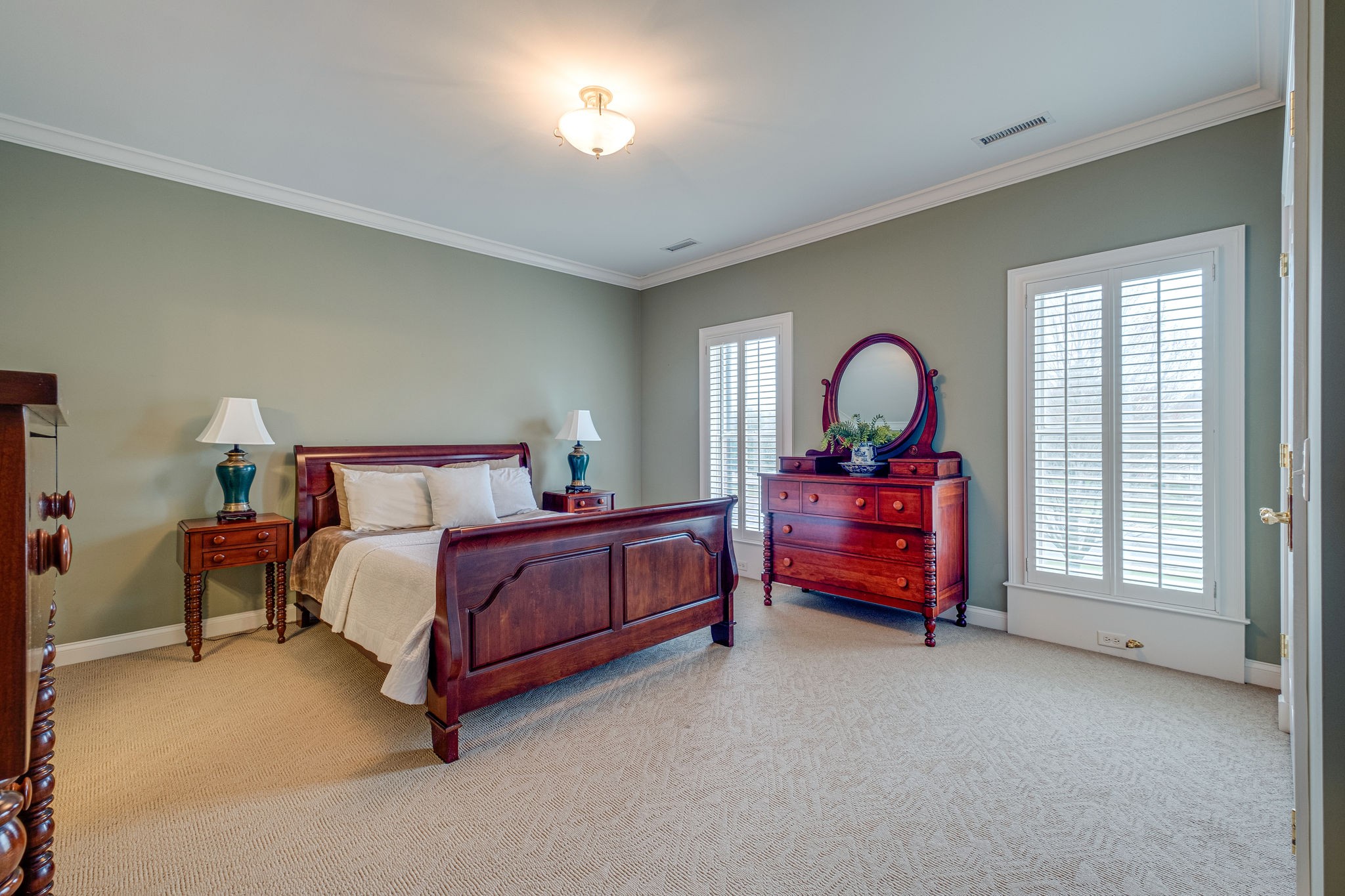1727 Shagbark Trail Murfreesboro, TN 37130 - Photo 21 of 32 a bed room with a bed and a large window