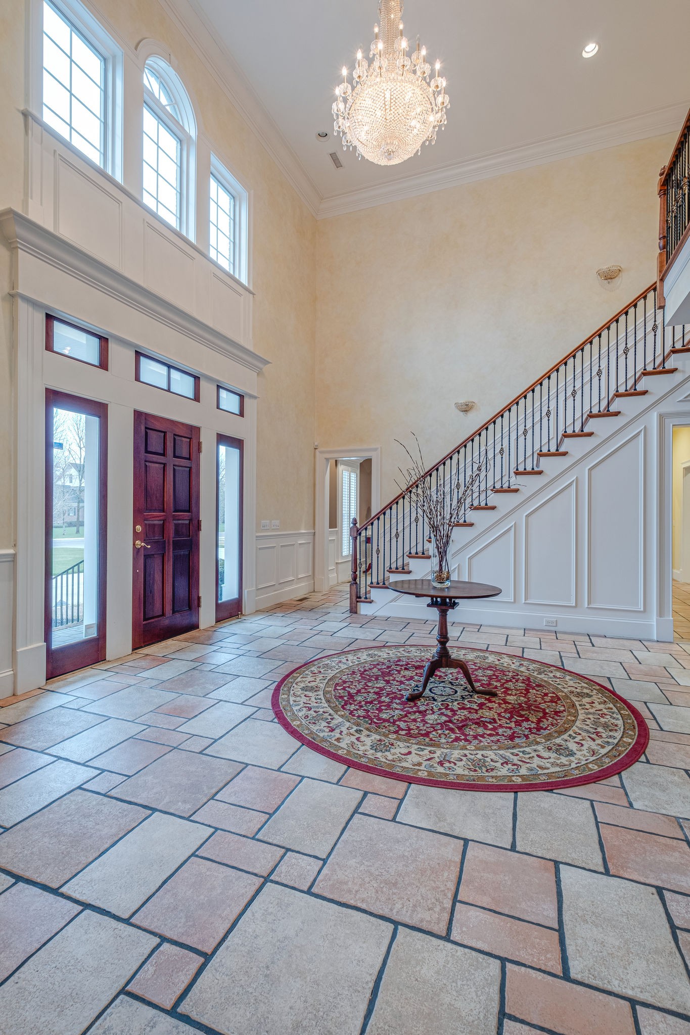 1727 Shagbark Trail Murfreesboro, TN 37130 - Photo 4 of 32 a view of a hallway with a chandelier and dining table