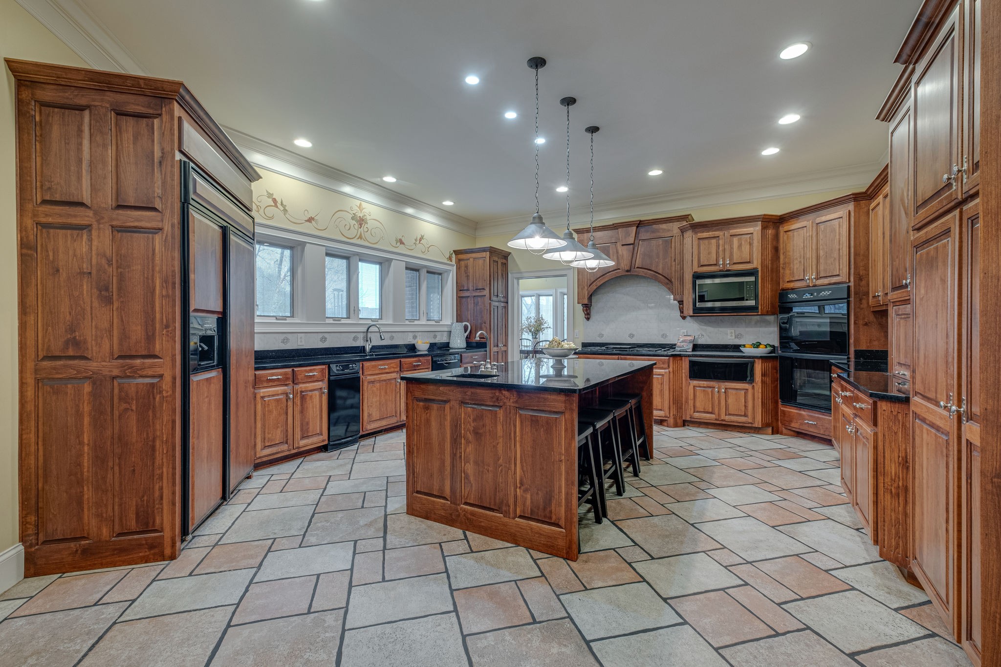 1727 Shagbark Trail Murfreesboro, TN 37130 - Photo 8 of 32 a kitchen with stainless steel appliances granite countertop a refrigerator and a sink