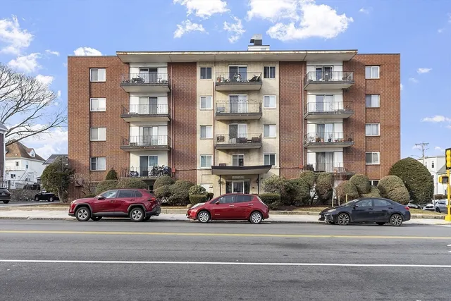a front view of a building with street view