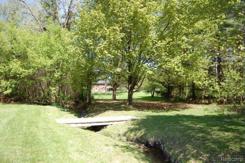 48251 Gyde Road Canton, MI 48187 - Photo 20 of 25 Wooded w/Stream