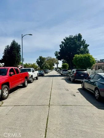 a view of a car parked in front of a house