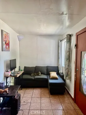 a kitchen with a table and chairs