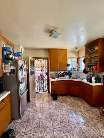 a room with lots of counter top space and furniture
