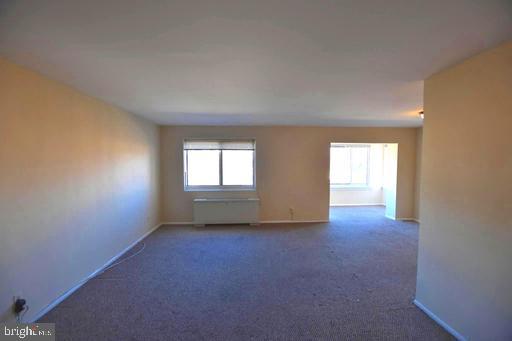 4313 Knox Road, Unit 501 College Park, MD 20740 - Photo 3 of 17 an empty room with windows