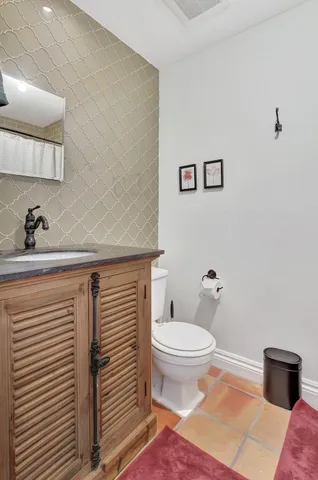 a bathroom with a sink and a toilet