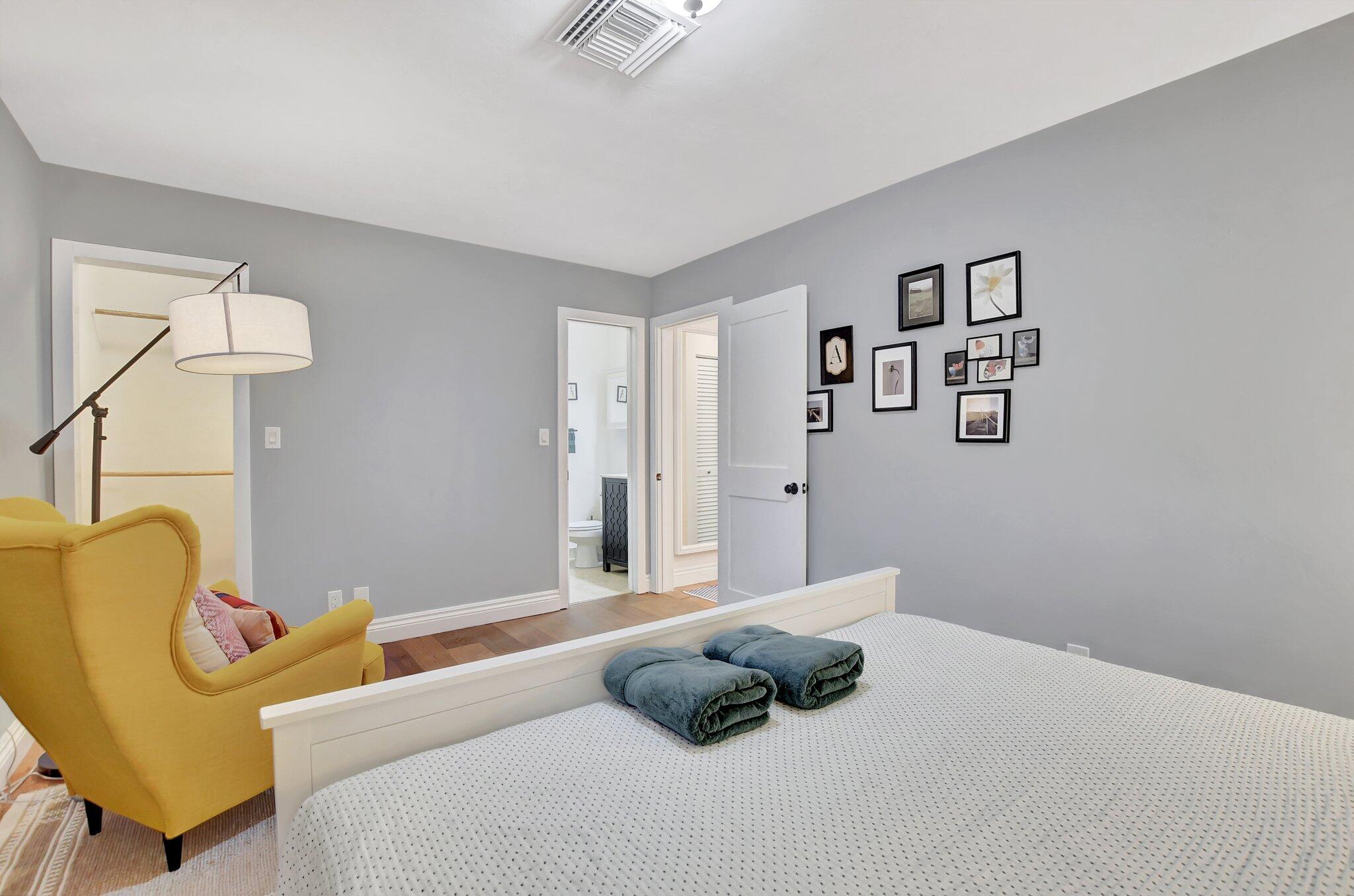 801 Southwest 5th Street Boca Raton, FL 33486 - Photo 24 of 50 a bedroom with a bed and window