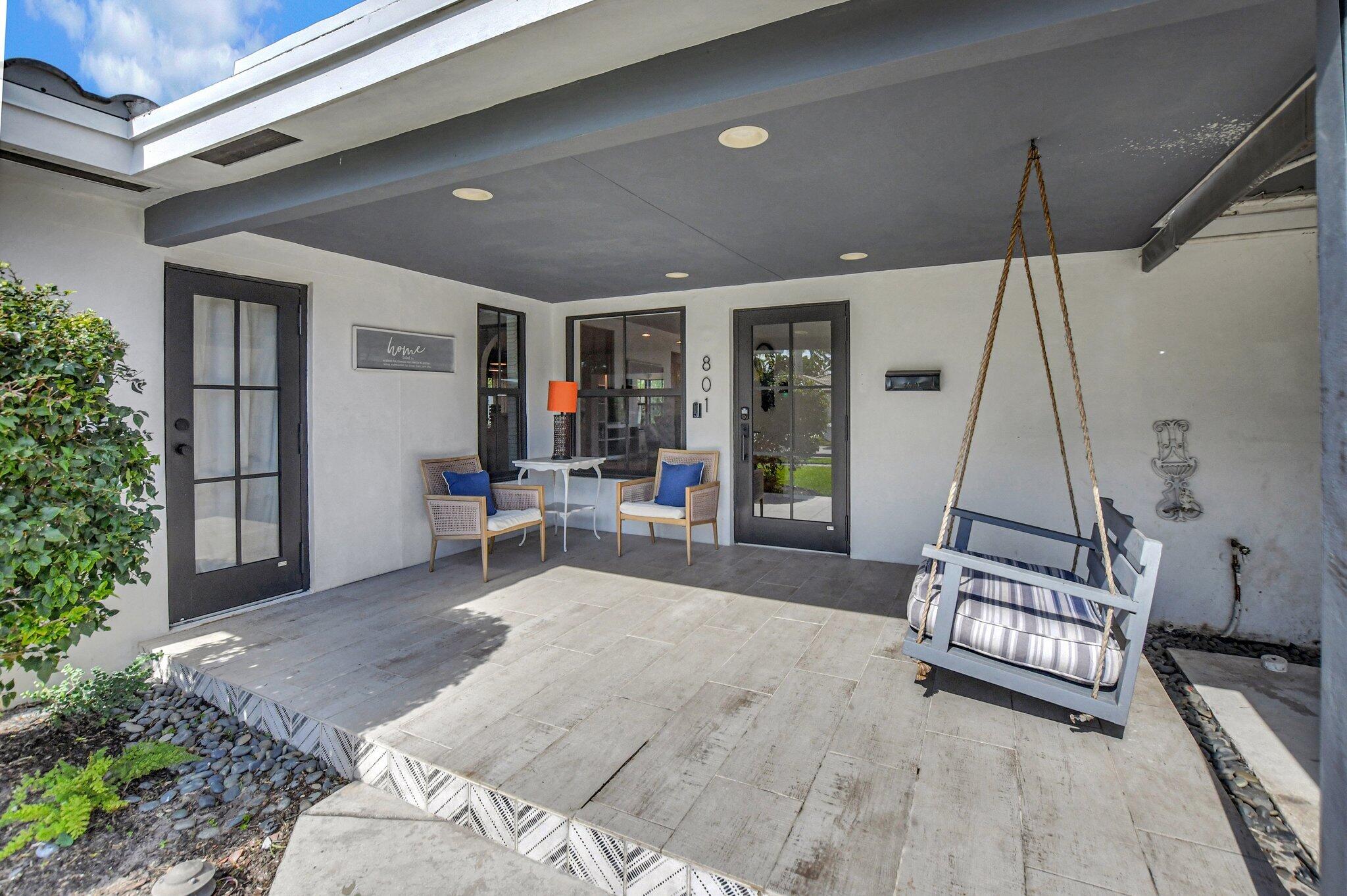 801 Southwest 5th Street Boca Raton, FL 33486 - Photo 3 of 50 a room with lots of furniture and white walls