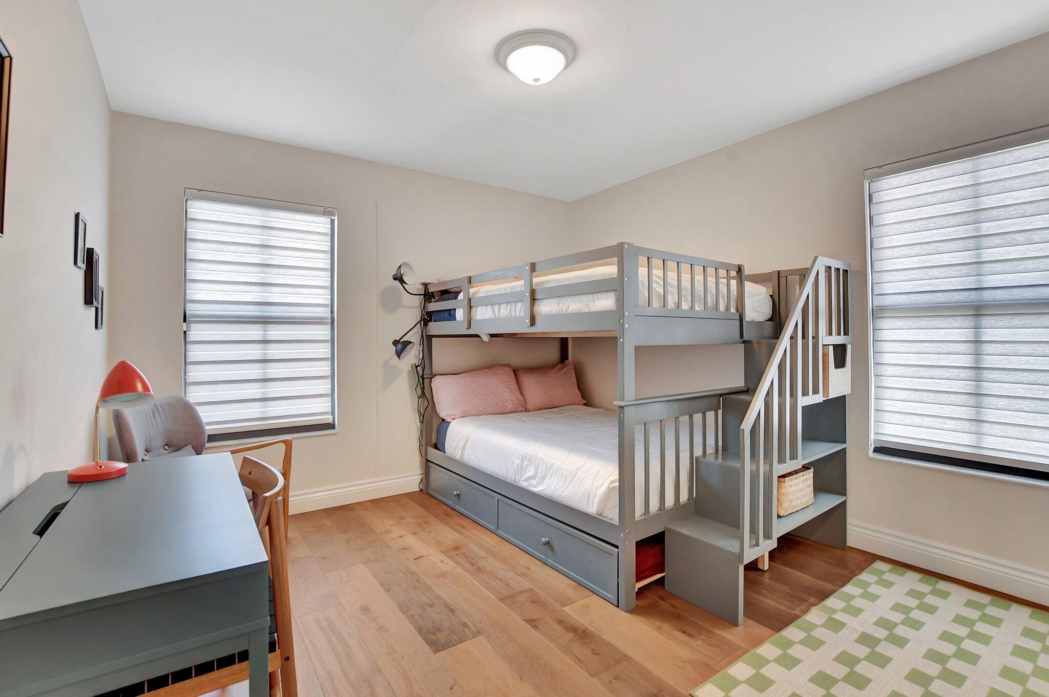 801 Southwest 5th Street Boca Raton, FL 33486 - Photo 35 of 50 a bedroom with furniture and a window