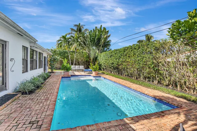 a swimming pool view with a outdoor space