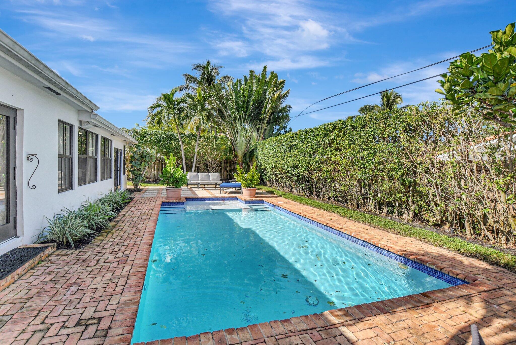 801 Southwest 5th Street Boca Raton, FL 33486 - Photo 49 of 50 a view of swimming pool with outdoor seating
