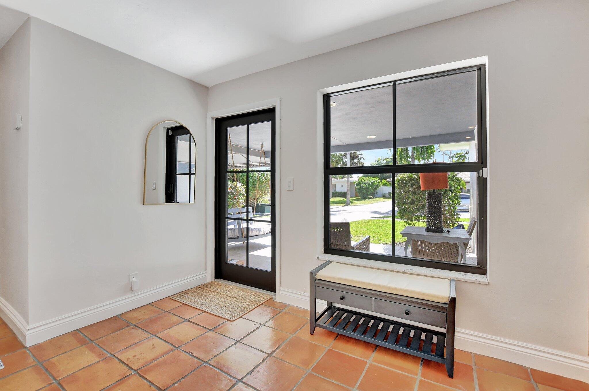 801 Southwest 5th Street Boca Raton, FL 33486 - Photo 5 of 50 a living room with furniture and a window