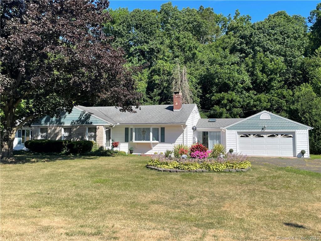 Front/ In law to left of house