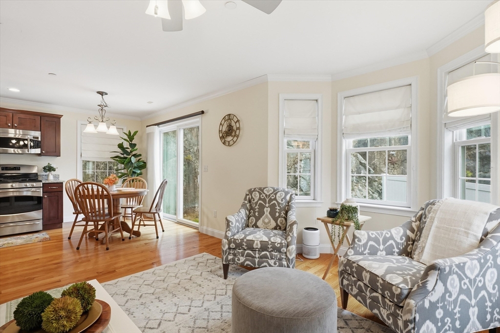 2 B Gates Lane, Unit B Wakefield, MA 01880 - Photo 8 of 42 a living room with furniture and a large window