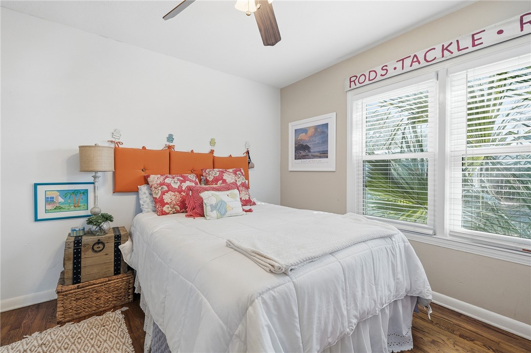 607 Chaparral Street Fulton, TX 78382 - Photo 16 of 40 a bedroom with a bed and a window