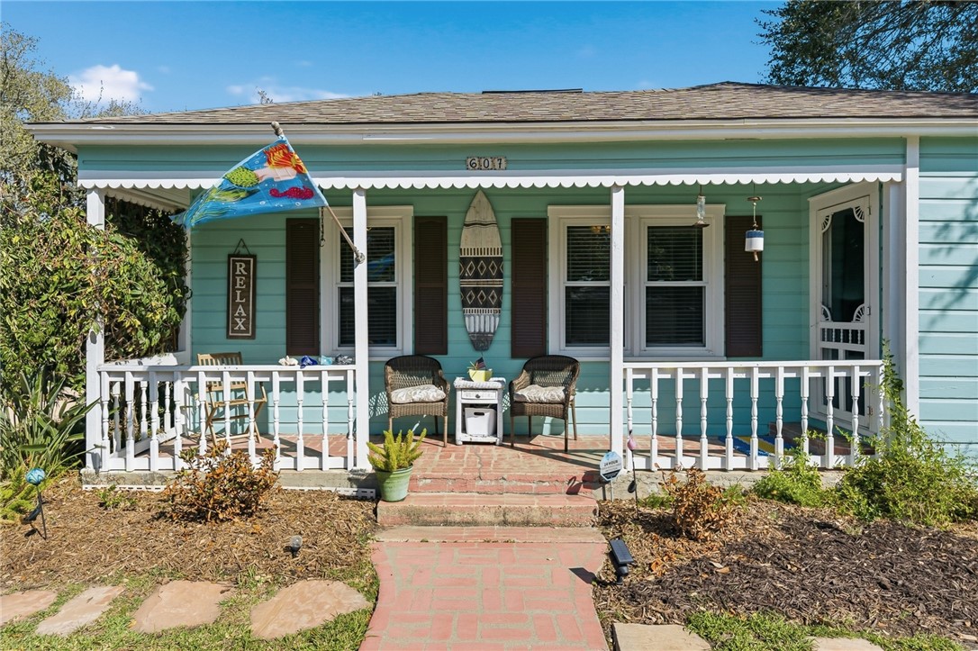 607 Chaparral Street Fulton, TX 78382 - Photo 2 of 40 a view of a porch with a fireplace
