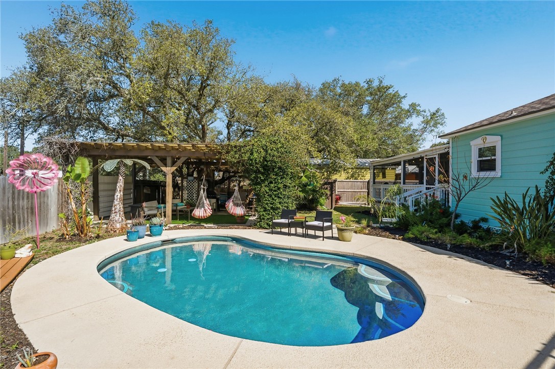 607 Chaparral Street Fulton, TX 78382 - Photo 26 of 40 a view of a house with swimming pool