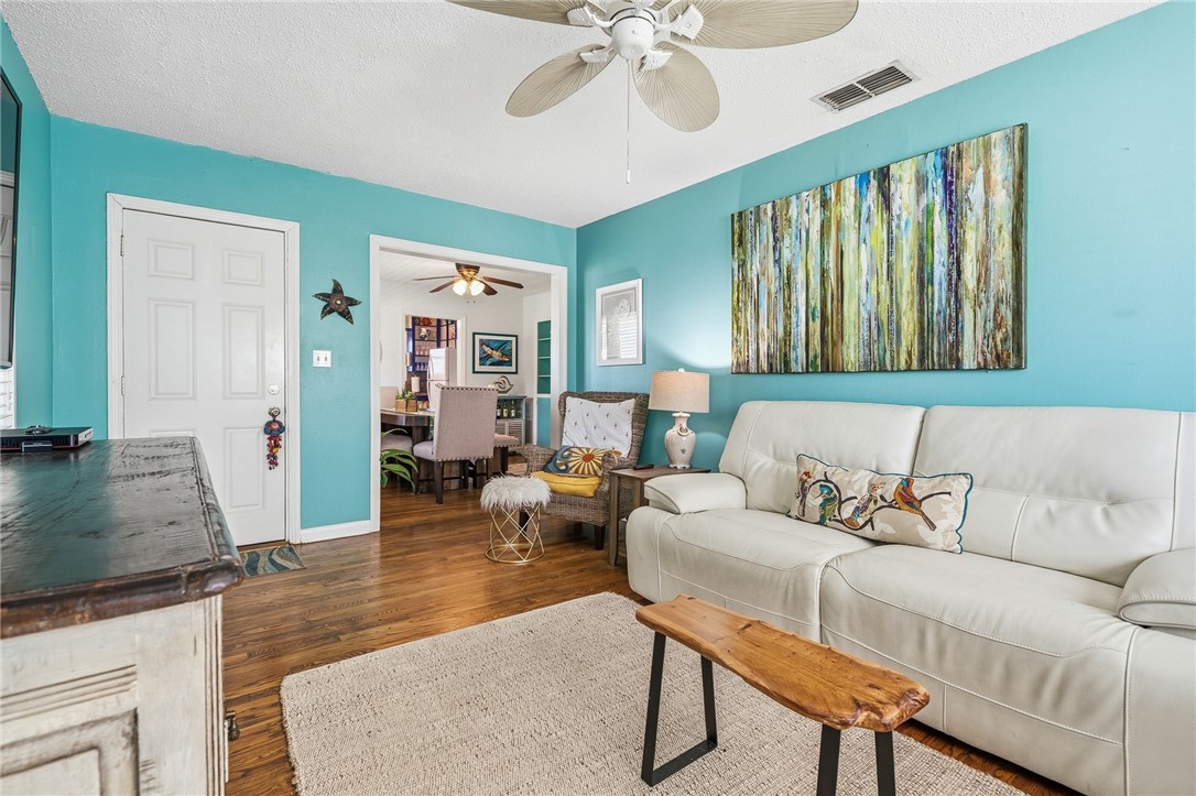607 Chaparral Street Fulton, TX 78382 - Photo 7 of 40 a living room with furniture and a large window